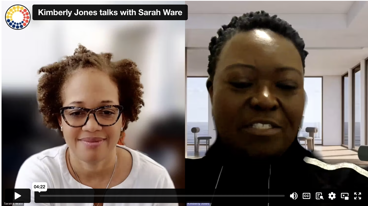 screenshot of a video call between two smiling Black professional women