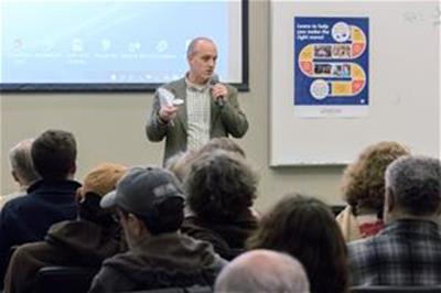 Randy Chambers speaking at Self-Help CU's 2018 Annual Meeting