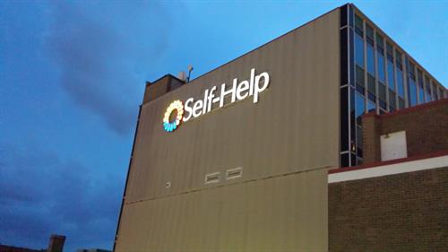 Nighttime view of Self-Help sign View of Self-Help sign illuminated at night