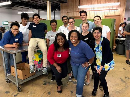 Summer interns in Durham, NC at a service project with a local food bank.