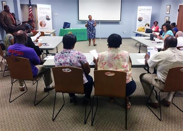 Self-Help staff lead a home buyers' workshop in Wilson, NC